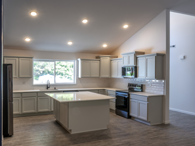 horshoe-bay-custom-home-reality-homes-2 Horseshoe Bay 1 Story Custom Home Kitchen with Island